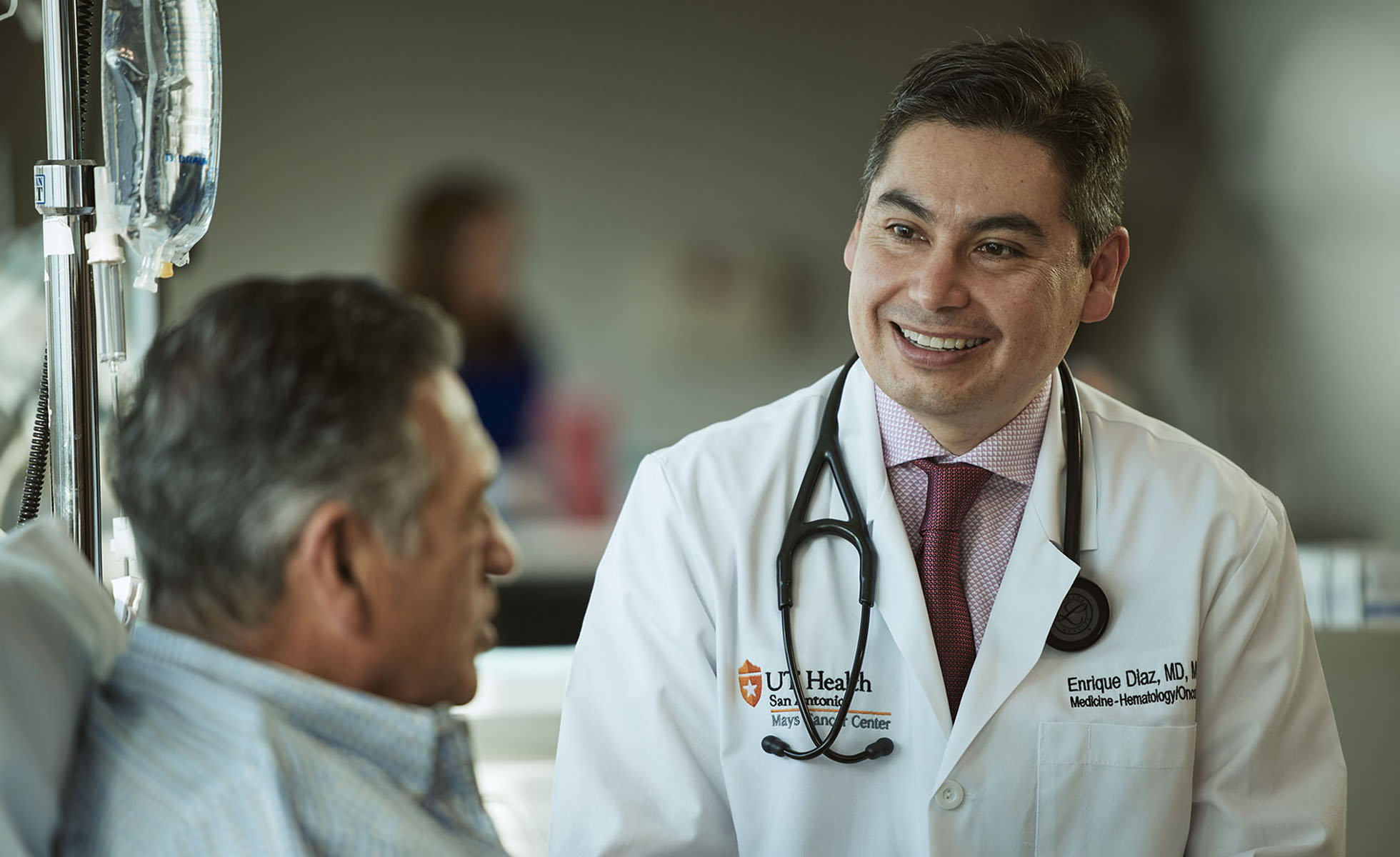 A doctor talking with a patient