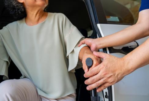 patient getting out of car, arriving to an appointment